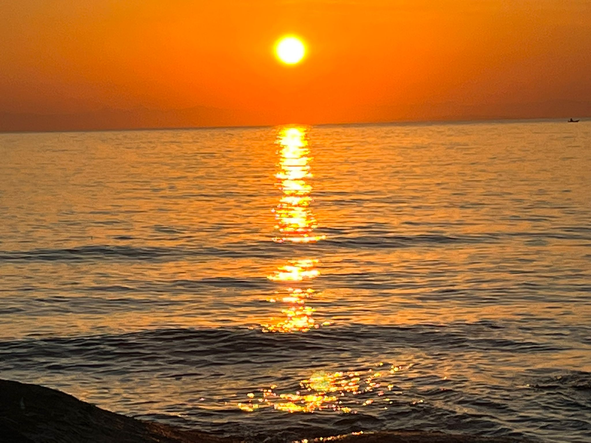 shore rising sun